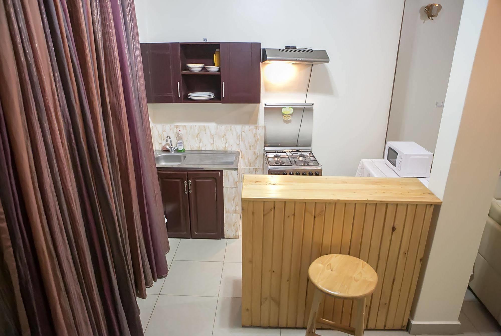 St Augustine Apartment & Hotel Кигали Екстериор снимка